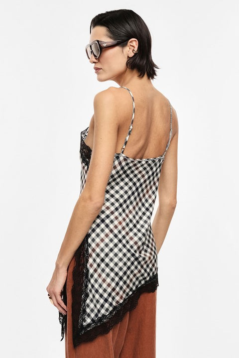 Top asimmetrico con pizzo e motivo a quadri