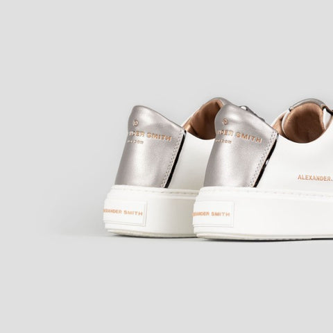 London woman white dark silver