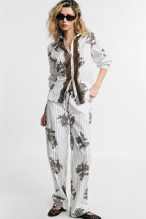Pantaloni palazzo fantasia a righe con coulisse