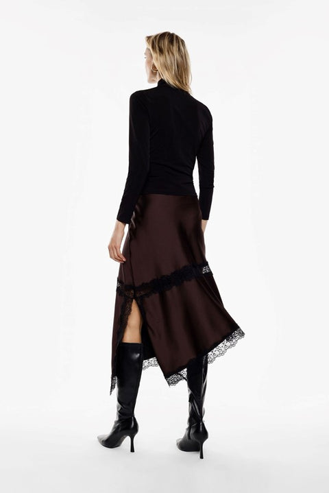 Gonna lunga asimmetrica con bordo in pizzo