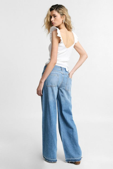 Jeans flare con vita bassa e fondo sfrangiato