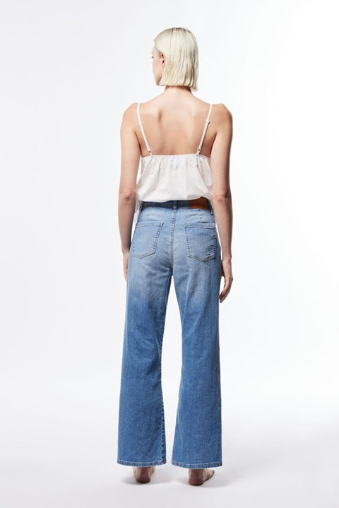 Jeans flare con vita media e tasche