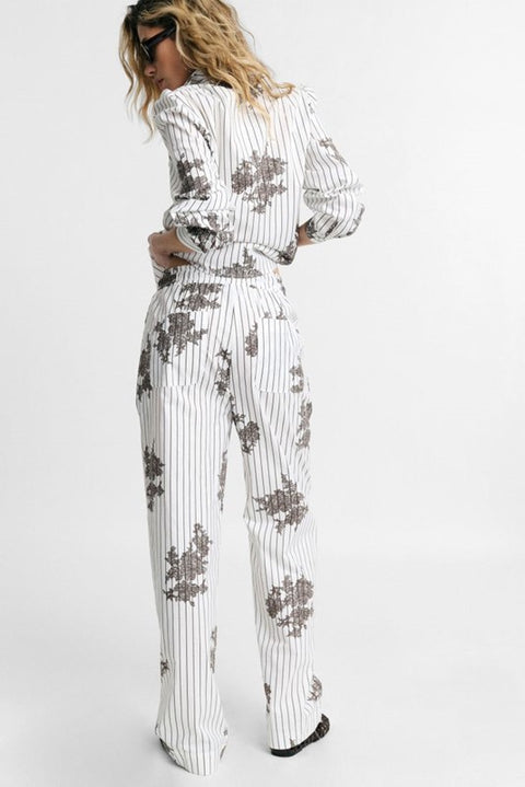 Pantaloni palazzo fantasia a righe con coulisse