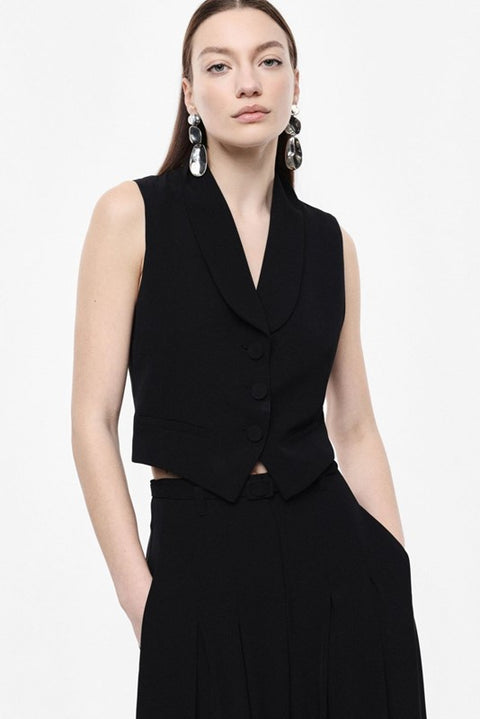 Gilet con rever e bottoni rivestiti