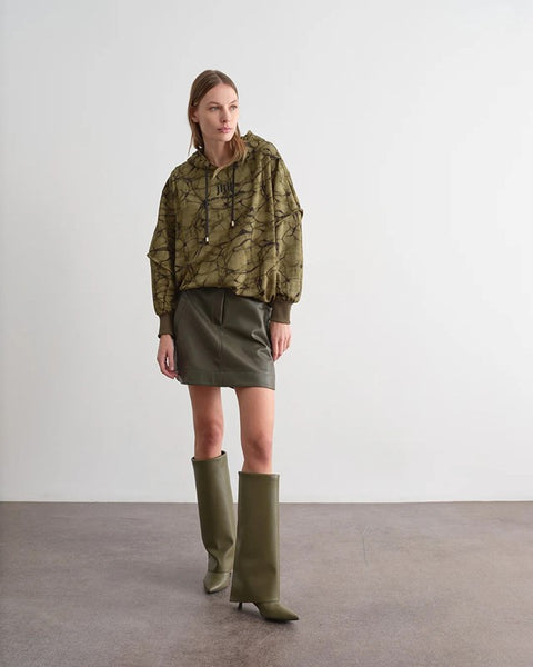 Minigonna con fibbia in metallo