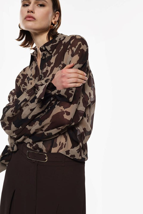 Blusa maculata con fiocco