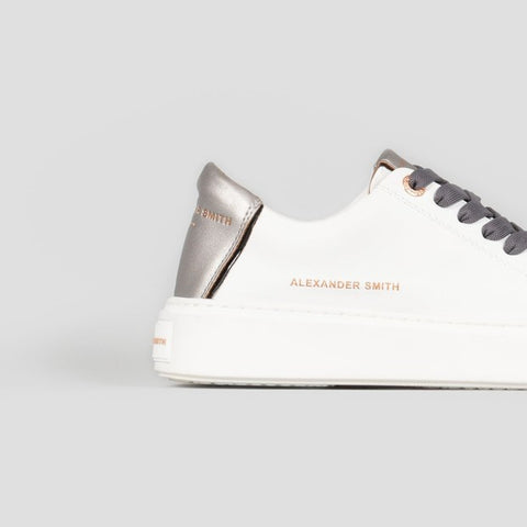 London woman white dark silver